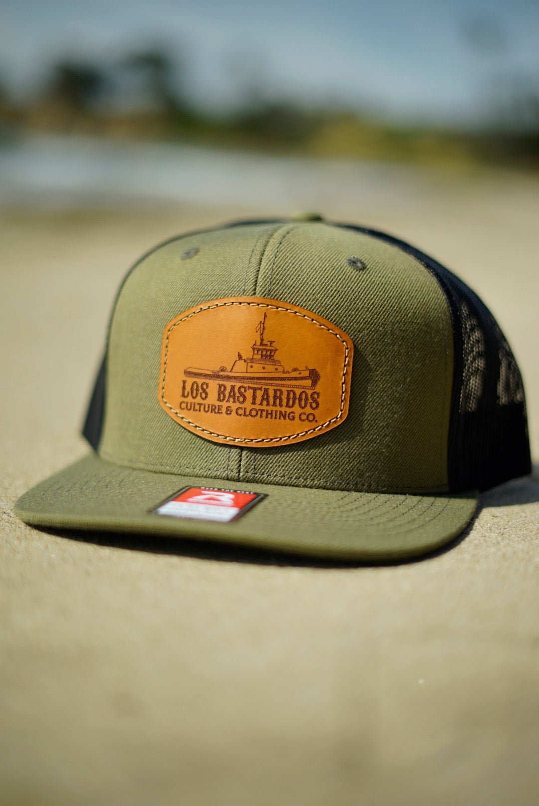 OG Bastardo Leather Patch 6-Panel Flat Bill SnapBack Hat By Los Basatardos Culture In Loden/Black (Discounted Spring Drop)